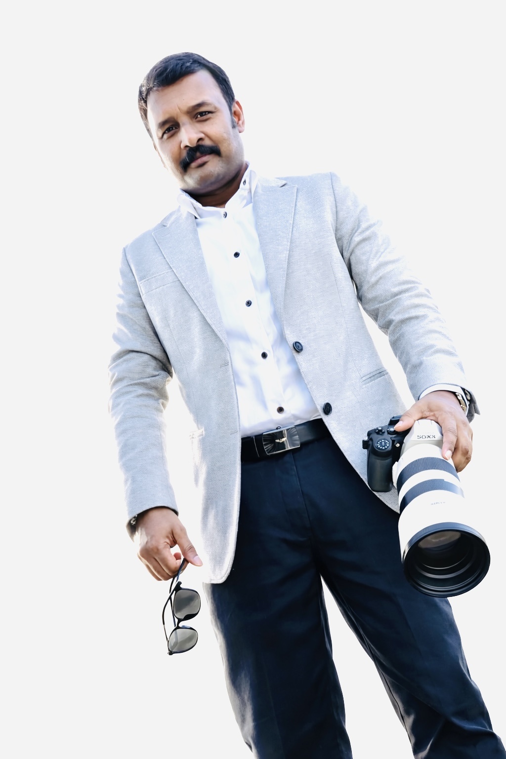 Bride and groom embracing outdoors at outdoor wedding